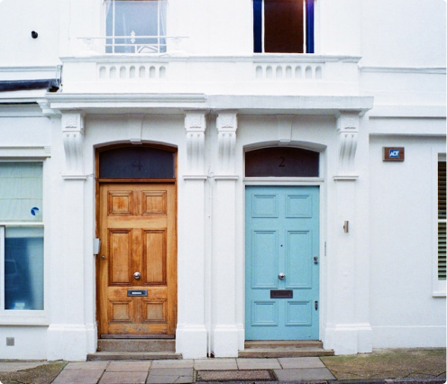 orange and blue doors over a white wall