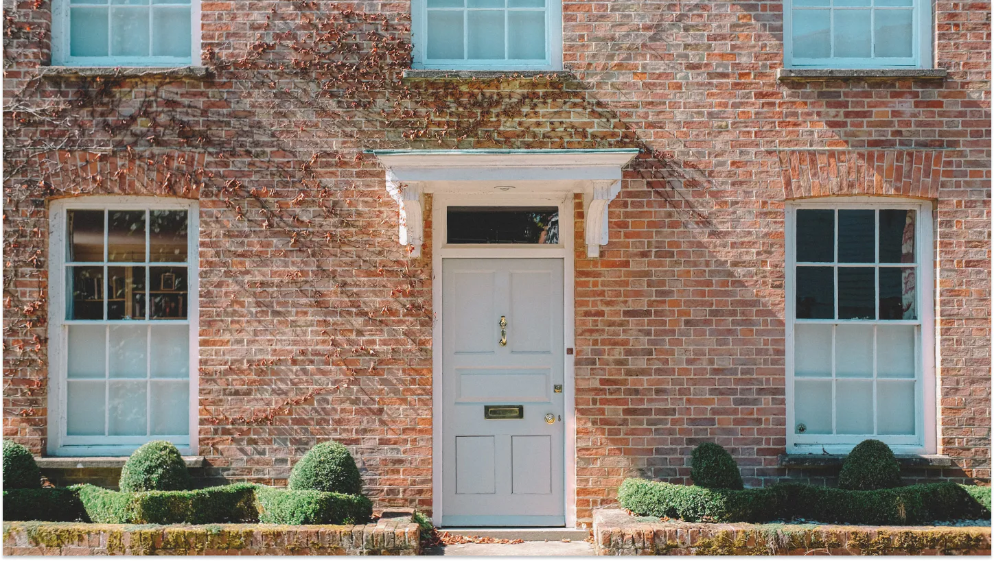 white door on a brick wall opt